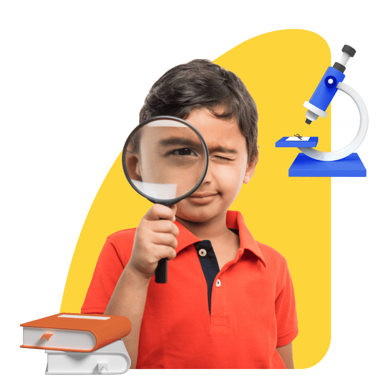 A boy examines a book through a magnifying glass, surrounded by additional books and a microscope on the table.
